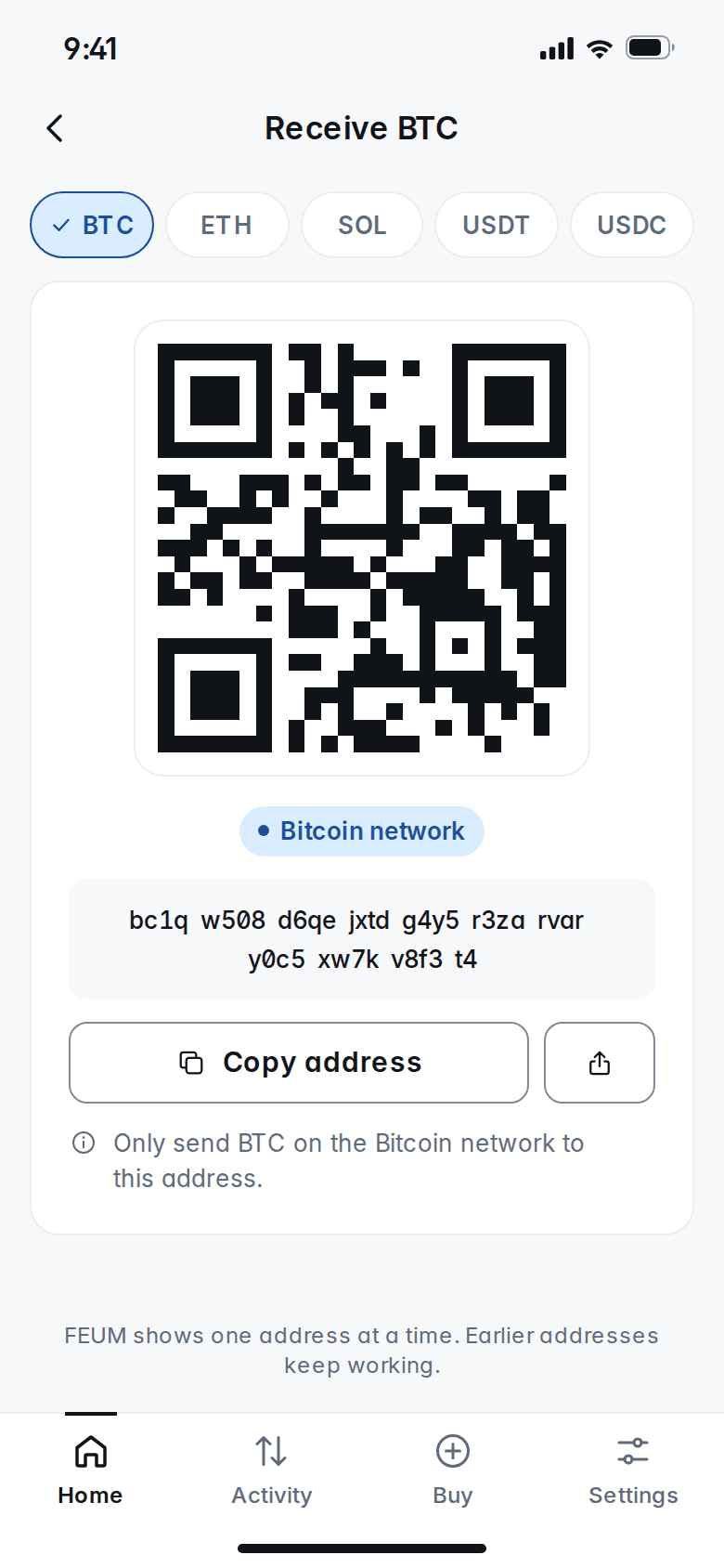 Receive screen with a QR code, the Bitcoin network label and the full address